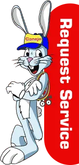 Conejo rabbit mascot, Gauge, standing up against a "request Services" sign