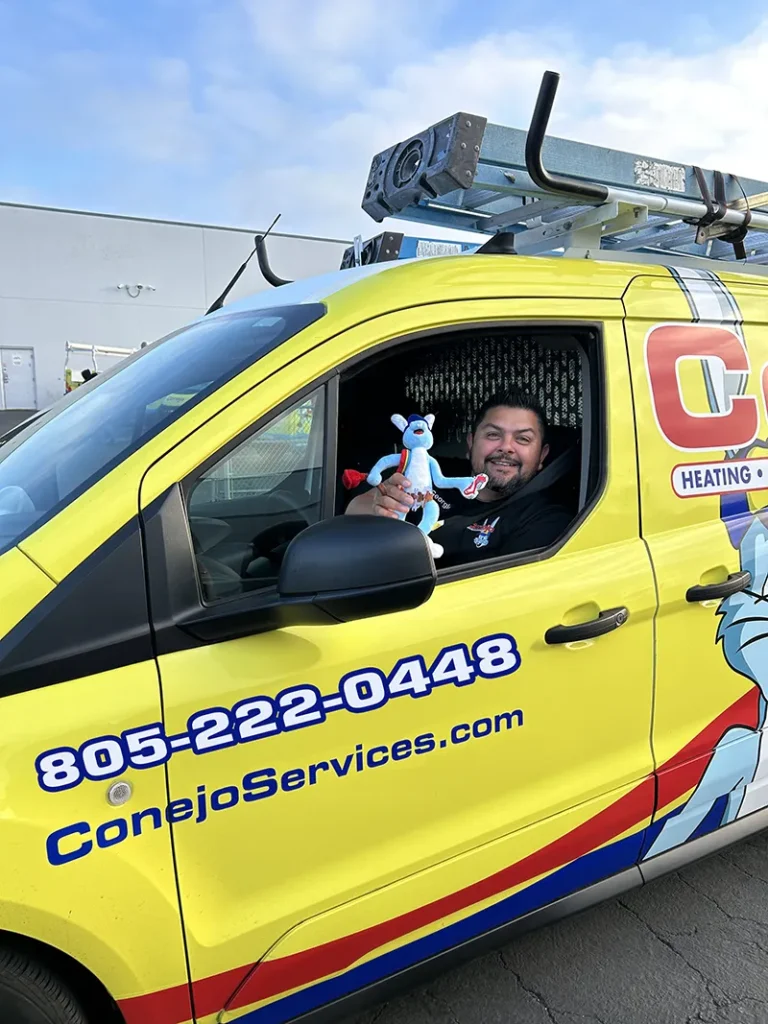 Service technician in Conejo Services vehicle